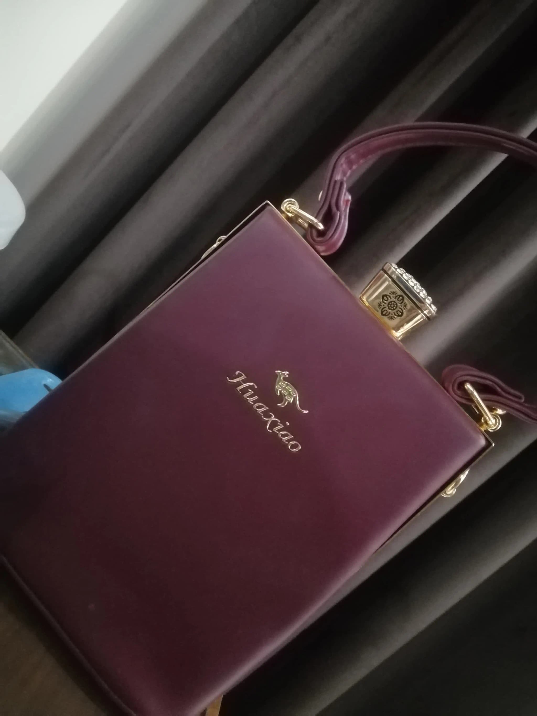 Hira with her Elixir handbag