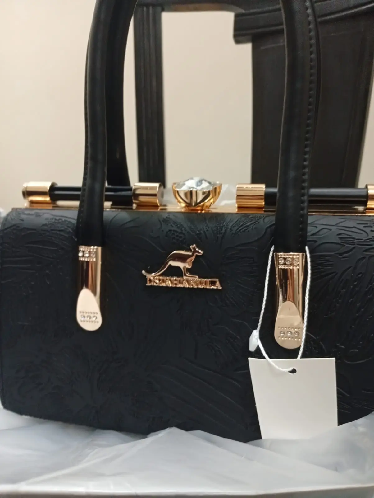Areeba with her Elixir handbag
