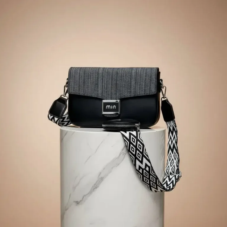 Luxurious black crossbody bag with strap for women in Pakistan.