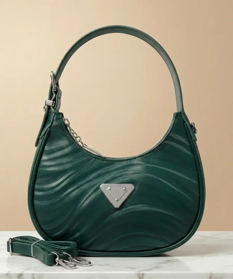 Forest green quilted hobo bag with silver triangle logo and shoulder strap - Elixir